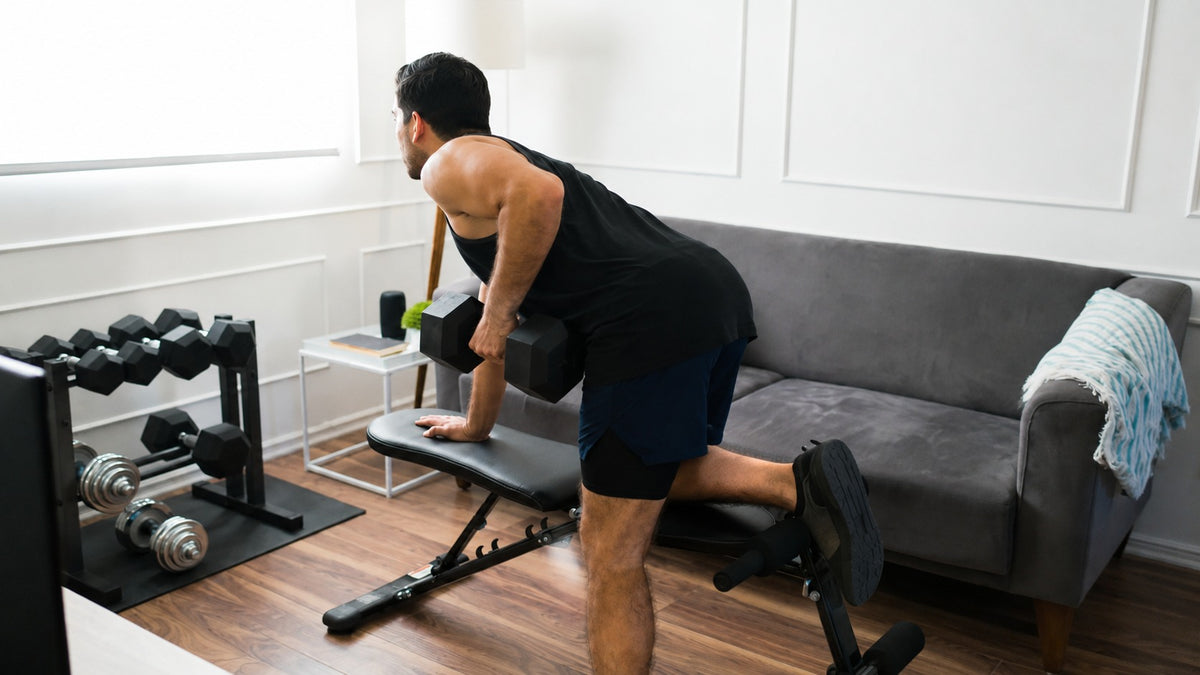 Fitness equipment arranged in a living room, creating a convenient space for home workouts and exercise.
